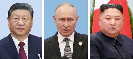 中国の習近平国家主席、ロシアのプーチン大統領、北朝鮮の金正恩朝鮮労働党総書記（朝鮮通信＝共同）