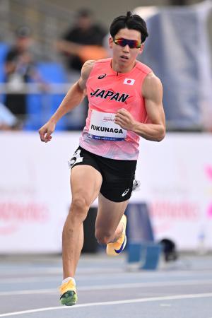 パラ陸上の世界選手権の男子４００メートル（視覚障害Ｔ１３）で銀メダルを獲得した福永凌太＝３日（ゲッティ＝共同）