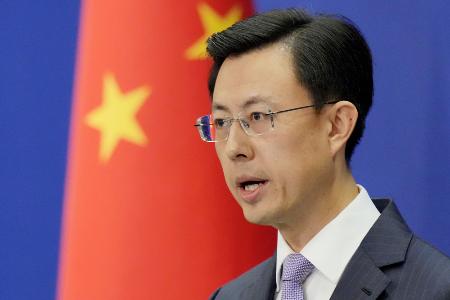 ９月、記者会見する中国外務省の郭嘉昆副報道局長＝北京