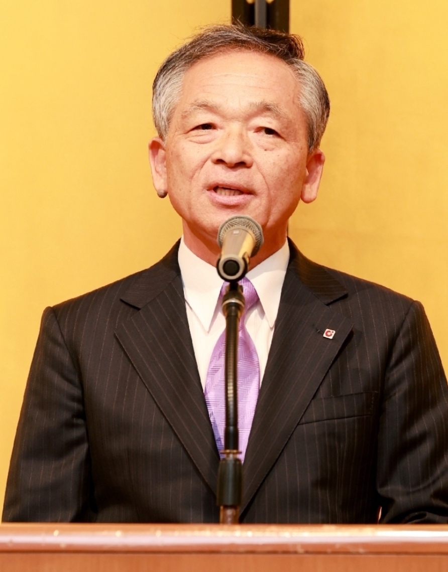 あいさつする後藤富一郎代表幹事