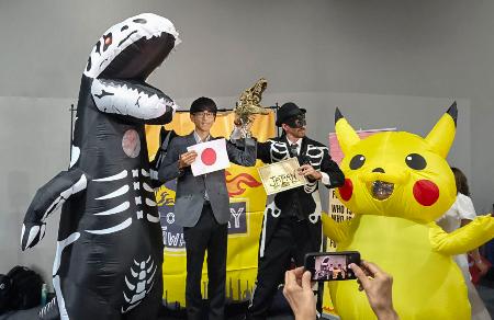 地球温暖化対策に後ろ向きな国に贈る「化石賞」のイベント＝ブラジル・ベレン（気候行動ネットワーク提供）