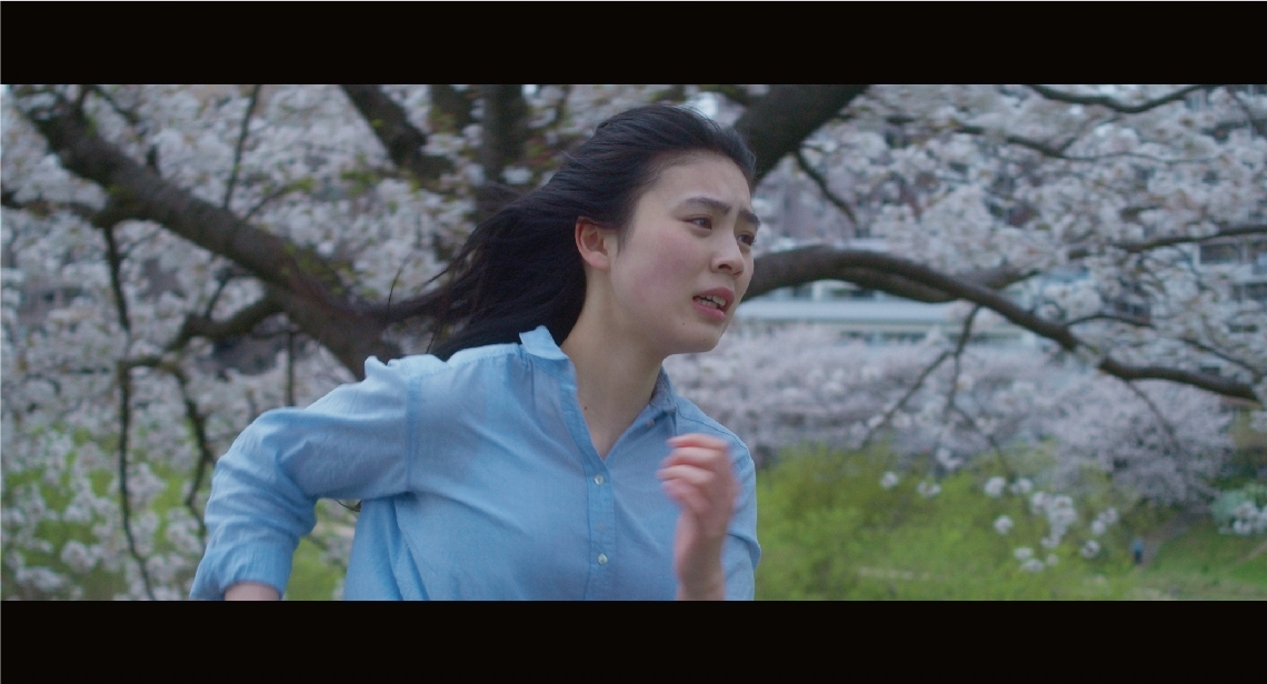 主演作「誰が為にフィルムはまわる」の一場面