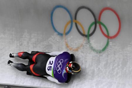 男子３回戦　滑走する高橋弘篤＝コルティナダンペッツォ（共同）