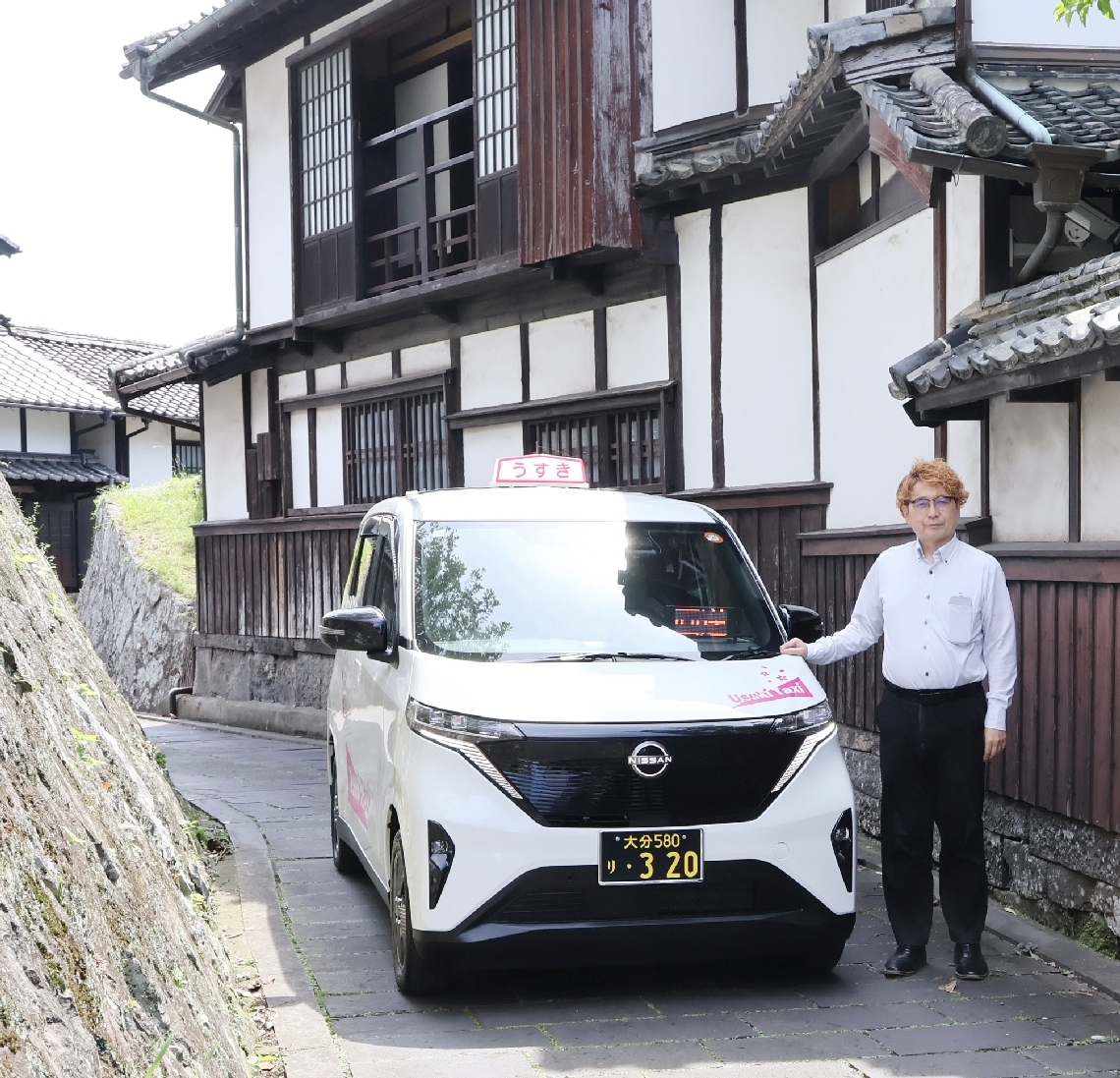 県内初の軽乗用車のＥＶタクシーを導入した臼杵タクシーの太田直樹社長